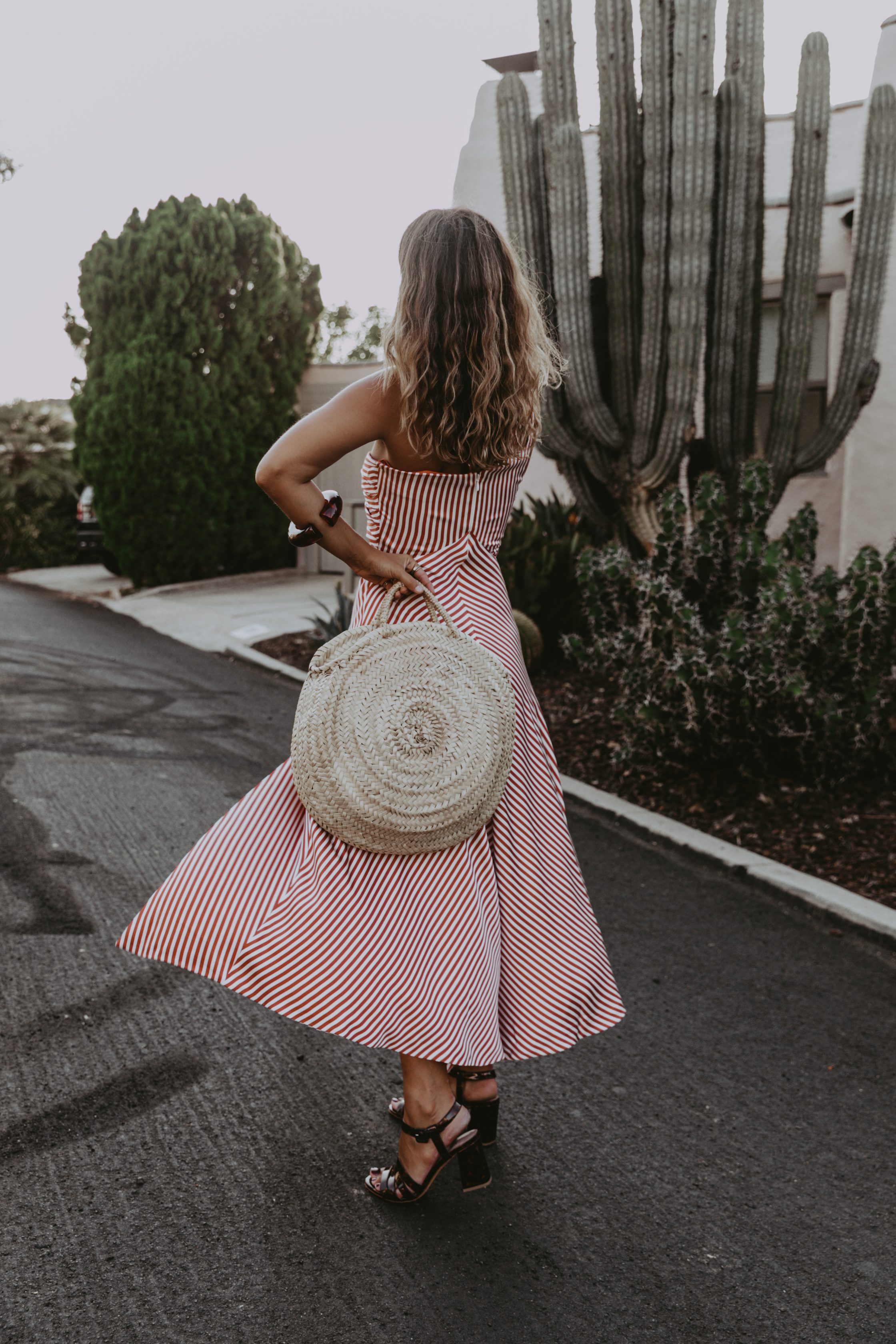 Sara Escudero for Collage Vintage is wearing a Jonathan Simkhai striped dress